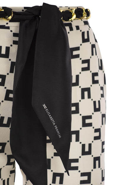 Logo print stretch crepe trousers with foulard belt - VOGUERINI