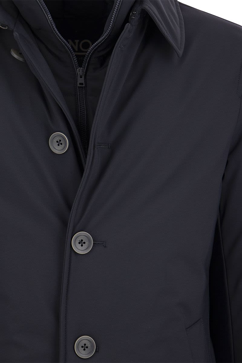 Long down jacket with buttons - VOGUERINI