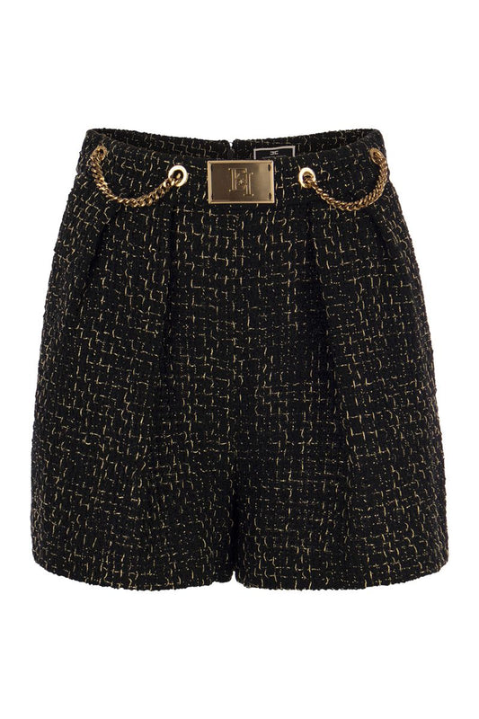 Tweed shorts with chains and logo plaque - VOGUERINI