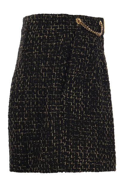 Tweed shorts with chains and logo plaque - VOGUERINI