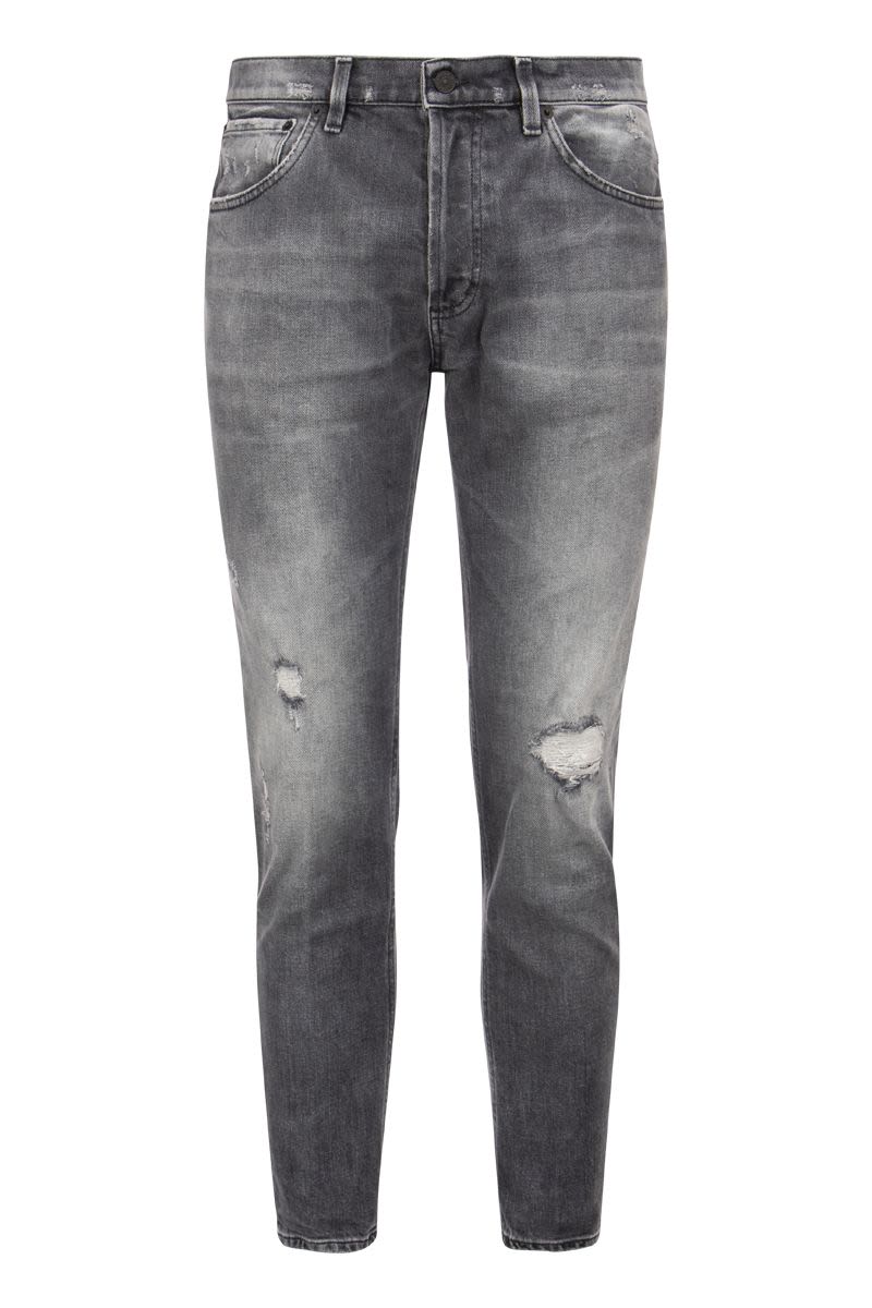 BRIGHTON - Carrot fit jeans with rips - VOGUERINI