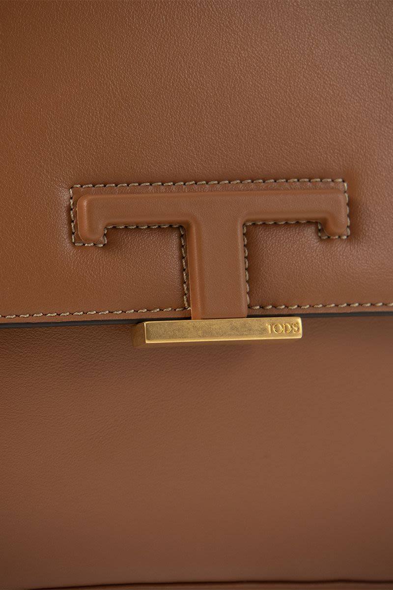 T Timeless - Mini leather shoulder strap - VOGUERINI