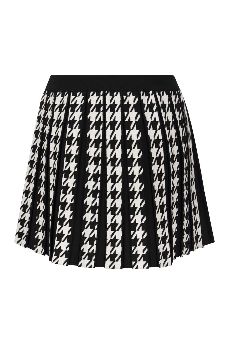 Pleated miniskirt with buttons - VOGUERINI